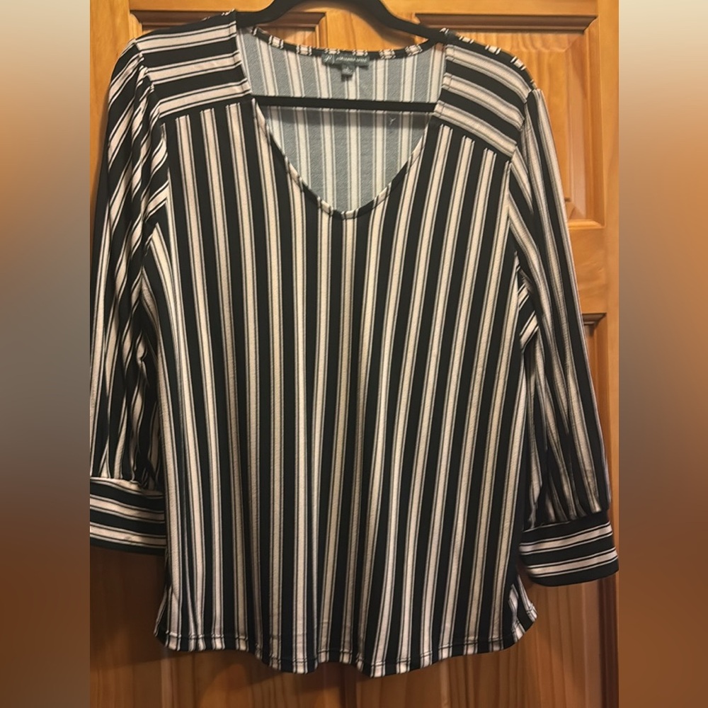 3 beautiful tops size Large by great deaigners